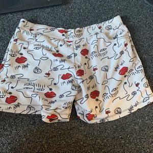 Soft abstract face stretchy shorts